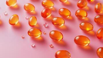 Orange tablets arranged on a pink surface in a vibrant, modern setting photo