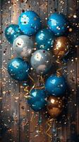 Blue and Gold Balloons Floating on Wooden Floor photo