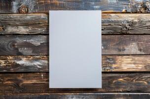 Blank White Paper On Rusted Wooden Background photo