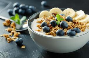 Yogurt Parfait With Granola, Banana, and Blueberries photo