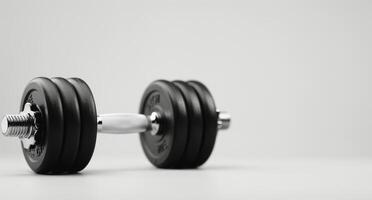 Black Dumbbell on White Background photo