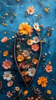 Colorful floral arrangement against a blue backdrop in a bright natural setting photo