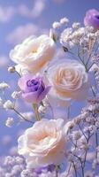 Beautiful arrangement of white and lavender roses with delicate filler flowers on blue background photo