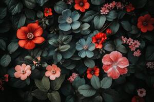 A vibrant array of colorful flowers amidst lush green foliage in a garden setting photo