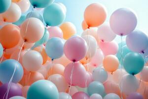 Colorful balloons floating under a bright blue sky during a cheerful outdoor gathering photo