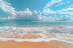 A seagull gliding above the ocean waves on a cloudy day at the beach photo