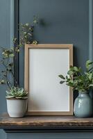 A stylish wooden frame set against a textured dark wall with minimalistic greenery decor photo
