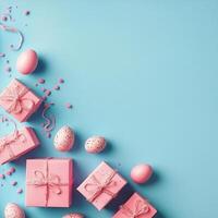 Colorful Easter gifts and decorated eggs arranged on a blue background with spring elements photo
