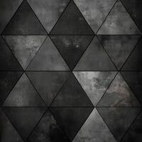 Abstract geometric pattern of dark textured tiles arranged in a modern design on a surface photo