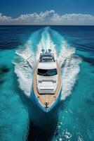 A boat gliding through crystal clear turquoise waters near rocky coastline during sunny day photo