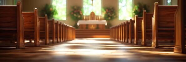 Interior of a quiet church with wooden pews leading to an altar in soft natural light photo