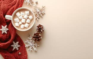 Cozy winter hot chocolate with marshmallows and pine cones on a red knitted blanket photo