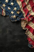 Worn American flag displayed artistically against a dark background in a serene setting photo