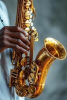 Close up of a musician playing a beautifully crafted saxophone during a live performance photo