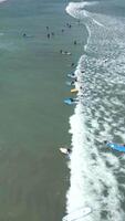 Aerial View Of People Taking Surfing Lessons In The Ocean, Bali, Indonesia. video
