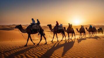 Camels walking through a desert at sunset, creating a serene travel scene. photo