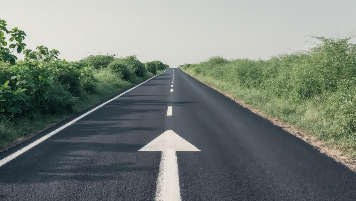 Project Roadmap Stock Photos Images - An Empty Road With An Arrow Pointing In The Direction Of The Future Photo 