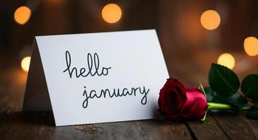 Rose and greeting card with handwritten message and bokeh lights background photo