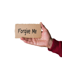 Hand holding a brown cardboard sign with text Forgive Me on a transparent background png