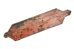 Close-up of a weathered, vintage, red-painted wood plank with visible wear and chipping, showcasing its rustic charm and character. png