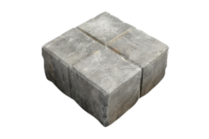 Close-up of a square concrete block with four smaller cubes, ideal for construction, architecture, or paving projects. png