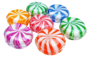 Assorted colorful peppermint candies in various colors and patterns, isolated on transparent background. Perfect sweets for holiday and party themes. png