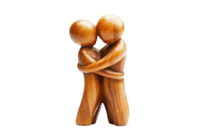 Wooden sculpture of two figures embracing, symbolizing love, connection, and unity on a transparent background. Handmade art piece showcasing affection. png