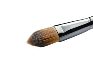 Close-up of a makeup brush with soft bristles and a sleek handle, perfect for applying foundation. Isolated on a transparent background. png
