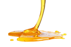 Golden honey flowing smoothly, creating a glossy pool on a transparent background. Perfect for food and natural sweetener themes. png