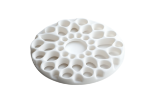 White round geometric ceramic structure with a honeycomb pattern, isolated on transparent background. Intricate, modern design for decor or art applications. png