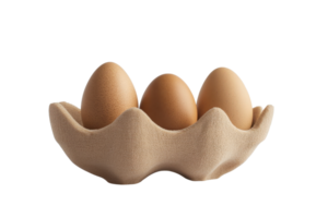 A close-up image of three brown eggs in an eco-friendly cardboard carton on a transparent background. highlighting freshness and simplicity. png
