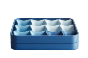 Blue and white ice cube tray with a modern design, perfect for chilling beverages and cocktails. High-quality, durable, and easy to use. png