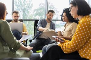Diverse team of managers working on a project in the office photo