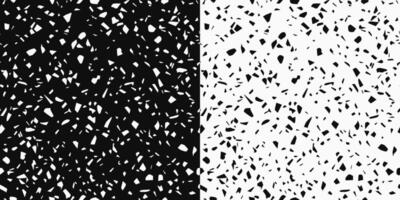 Seamless black and white texture with randomly scattered big polygonal particles. vector