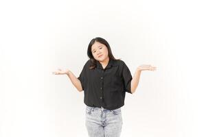 beautiful Asian woman strikes a wondering pose, arms spread wide in a questioning gesture against a white background photo