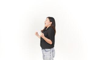 beautiful Asian woman in an angry pose, shouting with frustration, her intense expression clear against a white background photo