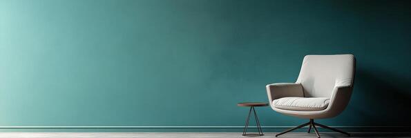 Cozy corner with a vintage armchair and small wooden table against a textured blue wall photo