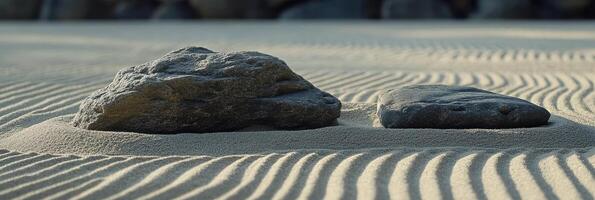 Tranquil Japanese garden with raked sand and a prominent stone under the suns warm glow photo