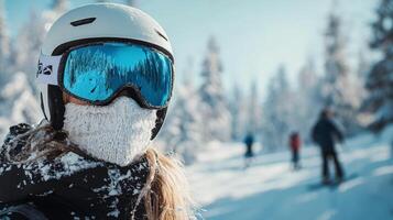 A young skier wearing protective gear amidst snowy trees on a bright winter day photo