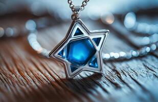 Shimmering blue star shaped pendant resting on a wooden surface, showcasing intricate design details photo