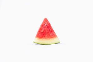 Whole watermelon and seeded slices seen front and top on a white background. Watermelon slices are red, seedy and juicy. photo