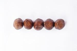 Snakefruit On White Background. Snake fruit path isolated on white. photo