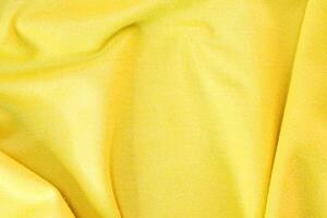 Abstract fabric background, Yellow fabric cloth background, texture of crumpled Yellow fabric background photo