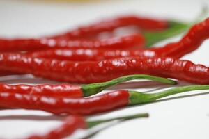 a bunch of fresh hot red a chilies photo