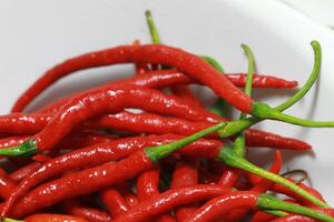 a bunch of fresh hot red a chilies photo