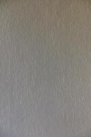 Textured Wall With Subtle Patterns Illuminated by Natural Light in a Serene Indoor Setting During the Afternoon Hours photo