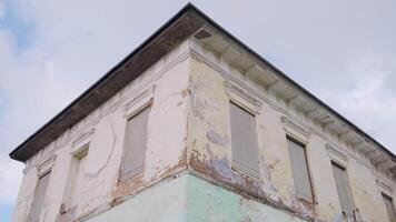 Old reconstructing buildings. Clip. Small houses in a small town shot against the background of the sun and a bright sky. video