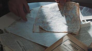Close up of various old letters and notes on pages. Stock footage. Paper background in a retro style. video