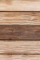 Natural wooden planks with variations in texture and color showcasing rustic beauty in warm tones photo