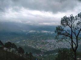 A view of the city from a mountain top photo